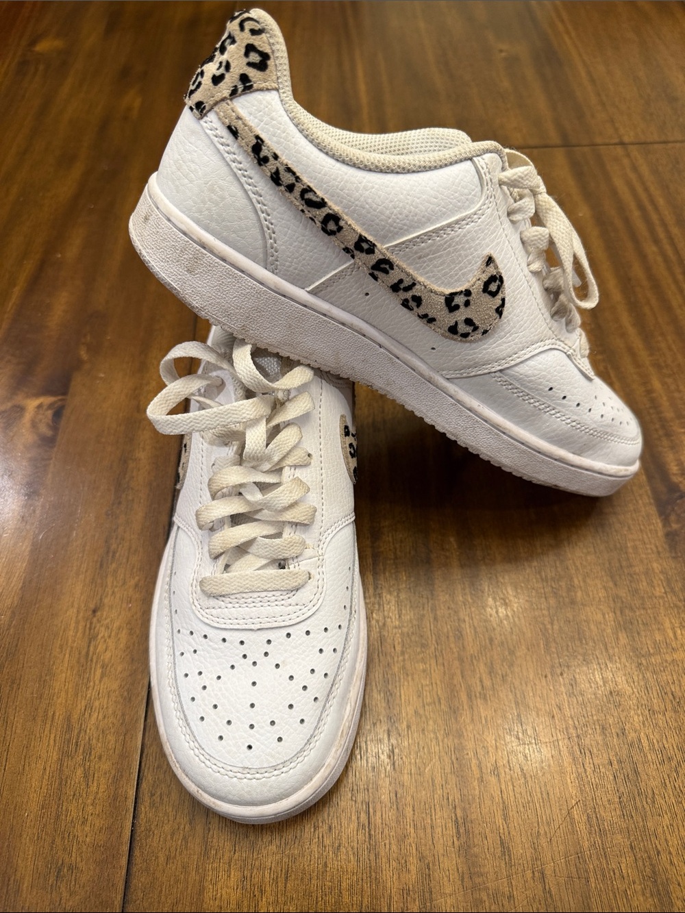 Nike Women's White Low-Top Sneakers with Leopard Swoosh